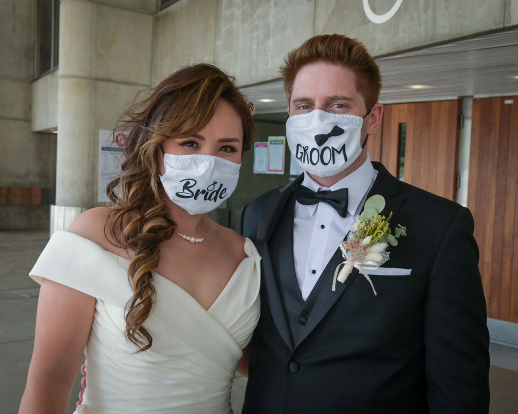 Bride and Groom portrait wearing masks